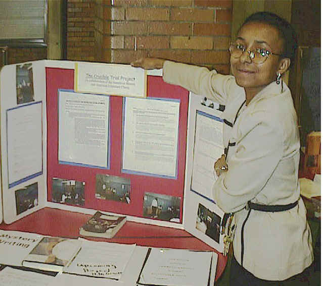 Ms Byrd Prepares a Class Exhibit for the Evening